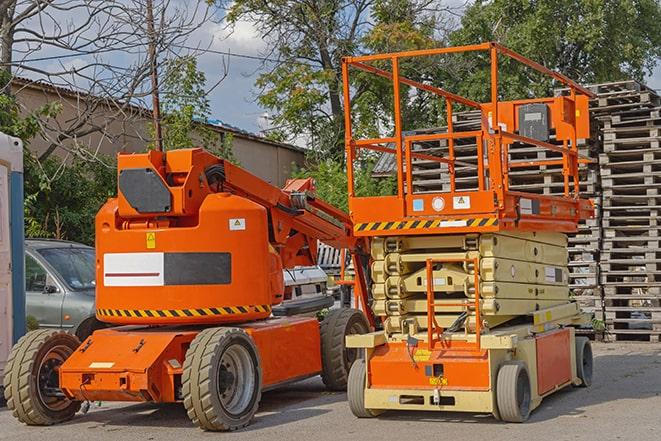 industrial forklift lifting heavy loads in warehouse in Chino, CA